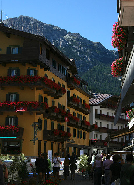 Tourists in front of De La Poste Hotel Cortina photo